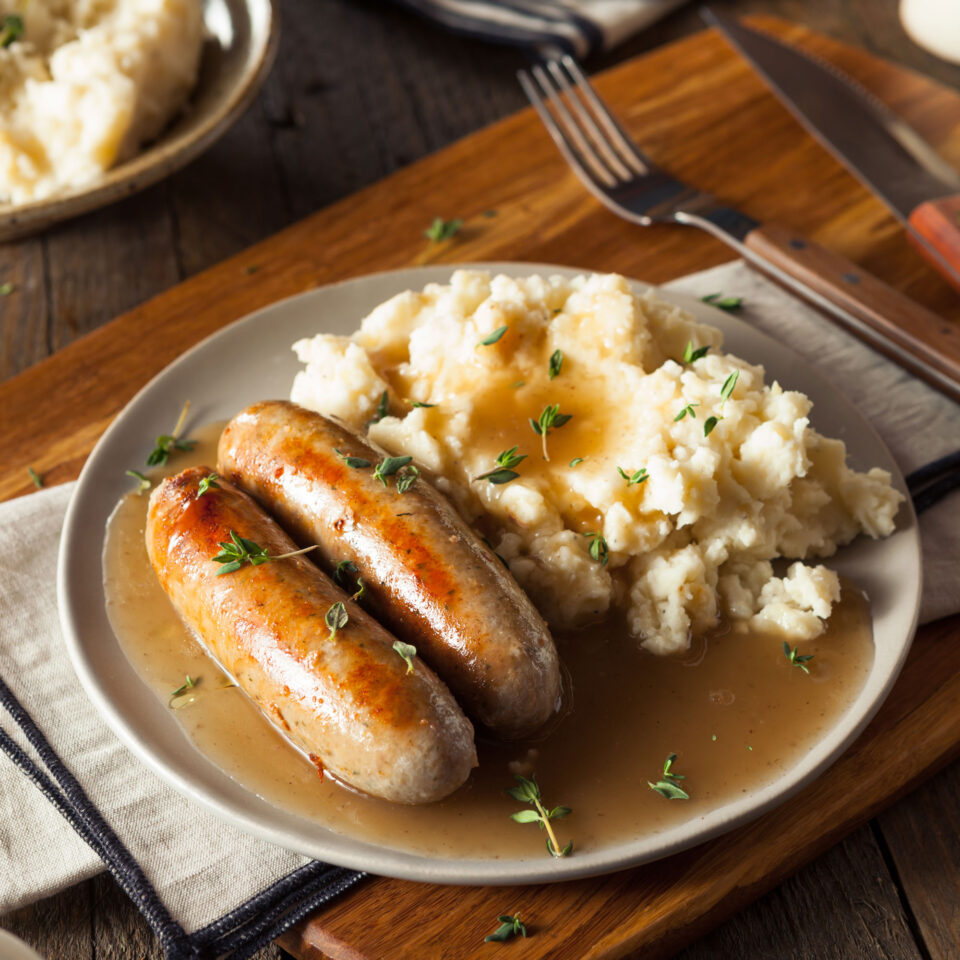 Plate of Sausage and mashed potatoes with gravy