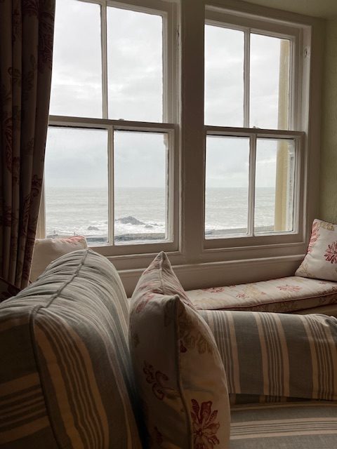 Armchair and window seat in the lounge at Hartland Quay Hotel