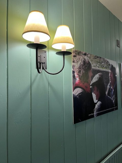 Wall Lamp and Film poster on the wall in the Wreckers Retreat pub